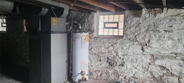 utility room with gas water heater