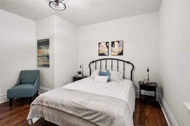 bedroom featuring dark hardwood / wood-style floors