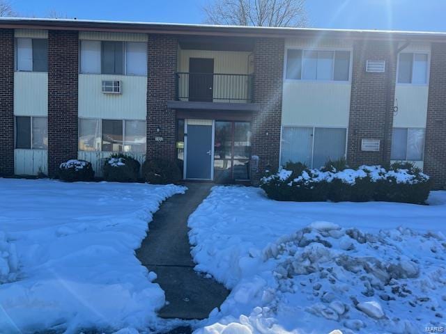 view of snow covered property