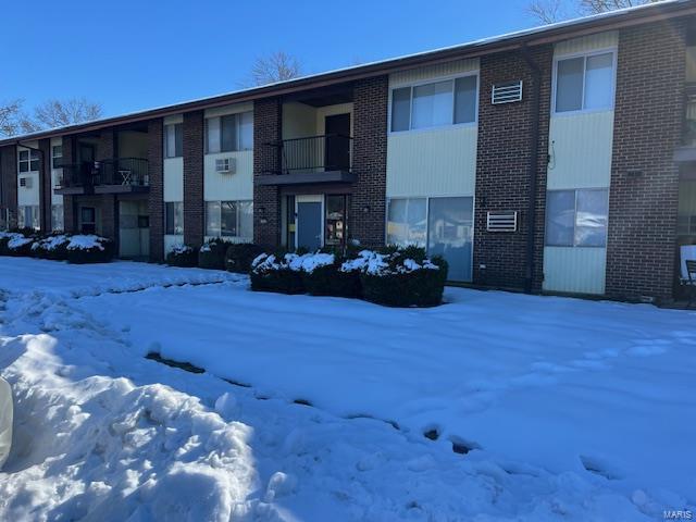 view of snow covered building