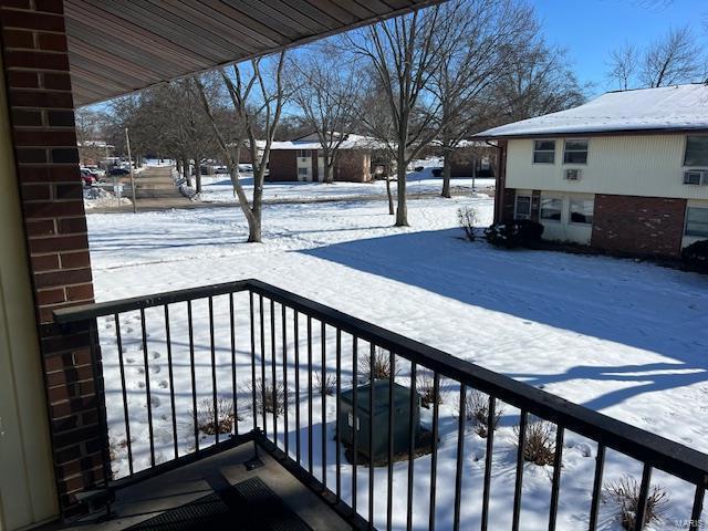 view of snow covered deck