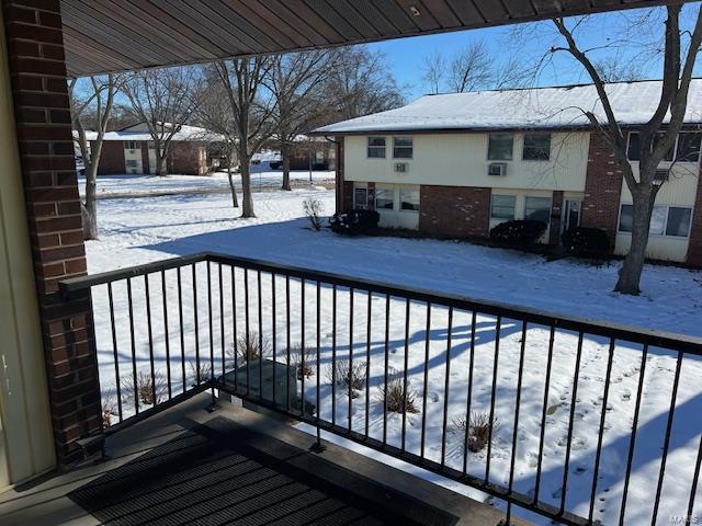 view of snow covered deck