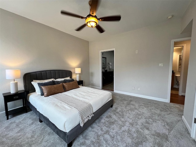 carpeted bedroom featuring ceiling fan and connected bathroom