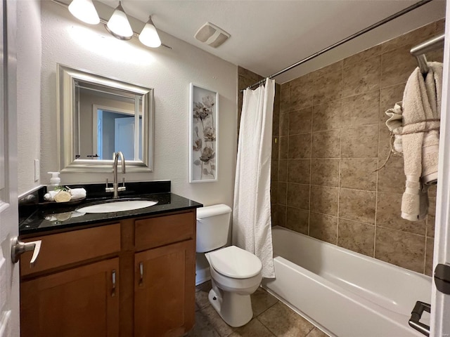 full bathroom featuring tile patterned flooring, shower / bath combo, vanity, and toilet