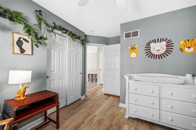 bedroom with light wood-type flooring