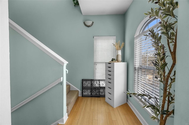 stairway featuring hardwood / wood-style flooring