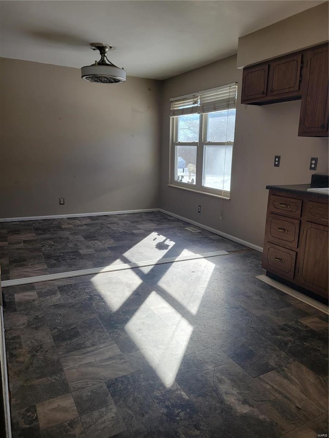 view of unfurnished dining area