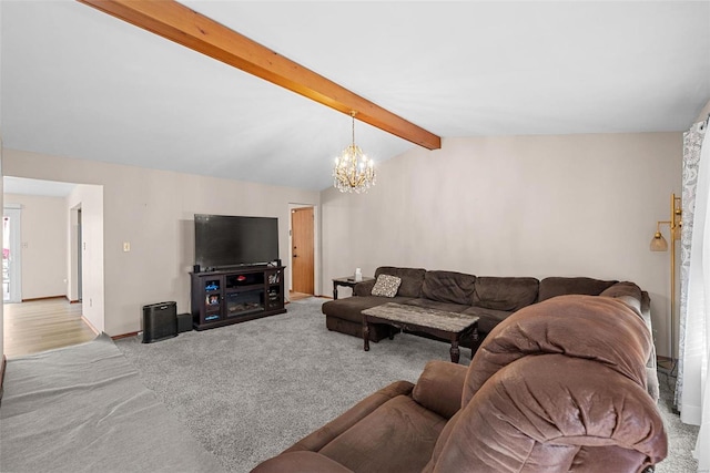 living room featuring vaulted ceiling with beams, light colored carpet, and an inviting chandelier