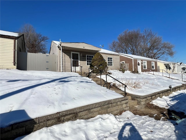 view of snow covered property