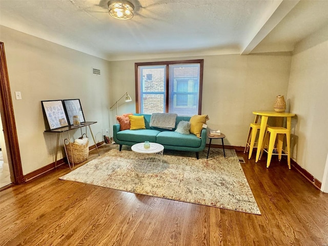 living room featuring dark hardwood / wood-style floors