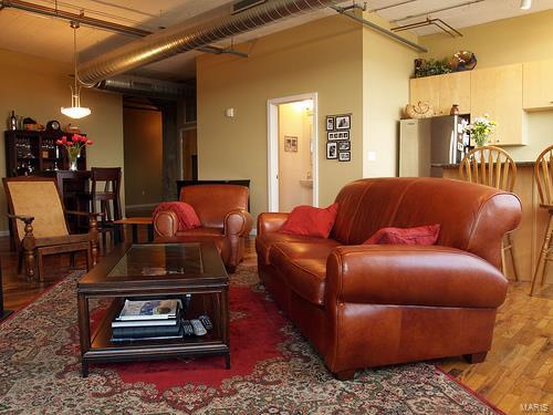 living room with dark hardwood / wood-style flooring