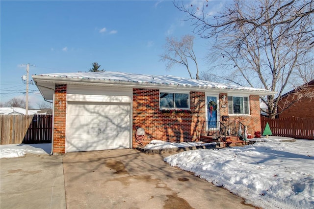 single story home featuring a garage