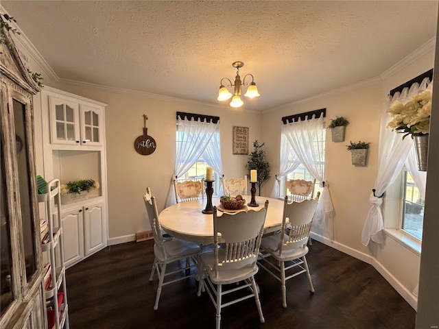 dining space with plenty of natural light, dark wood-type flooring, and an inviting chandelier