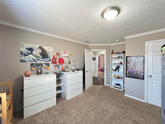 carpeted bedroom with ornamental molding and a textured ceiling