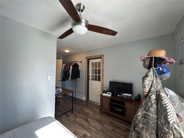 bedroom featuring dark wood-type flooring and ceiling fan