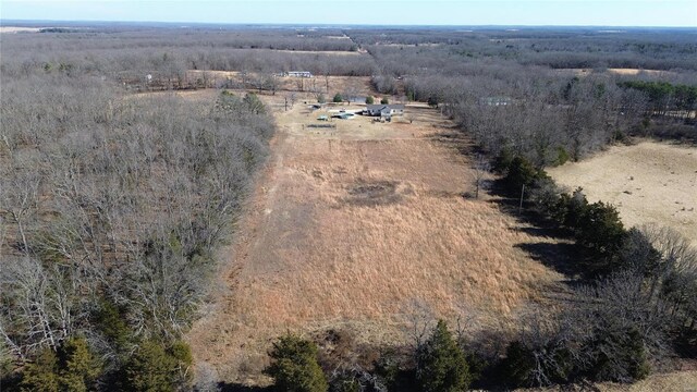 birds eye view of property with a rural view