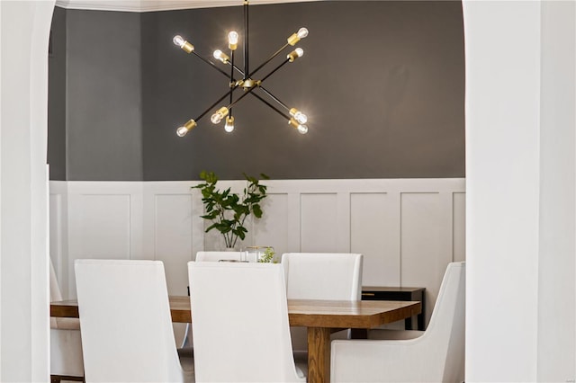 dining area featuring a chandelier