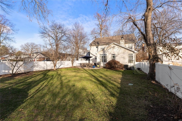 view of yard with central AC unit