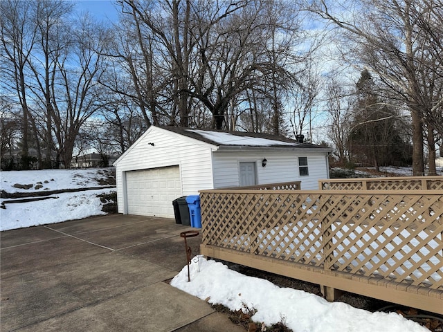 view of snow covered garage