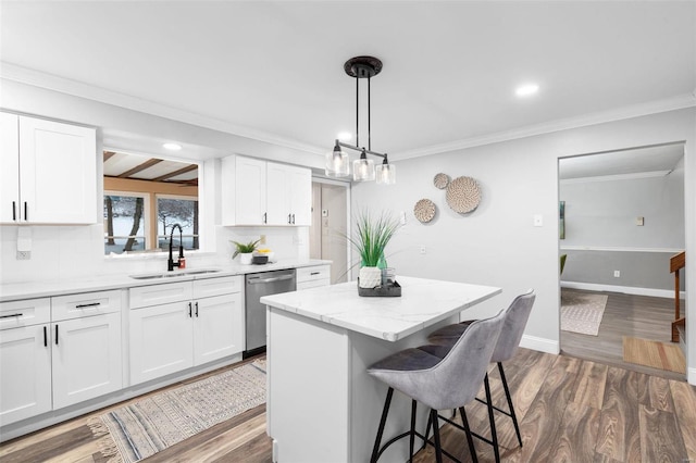 kitchen with sink, stainless steel dishwasher, and white cabinets