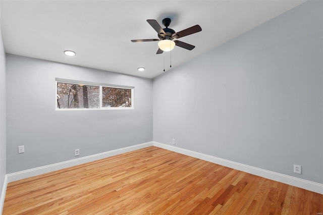 empty room with light hardwood / wood-style floors and ceiling fan