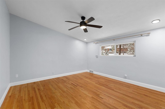 unfurnished room with wood-type flooring and ceiling fan