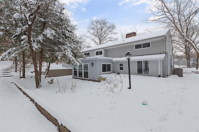 view of snow covered property