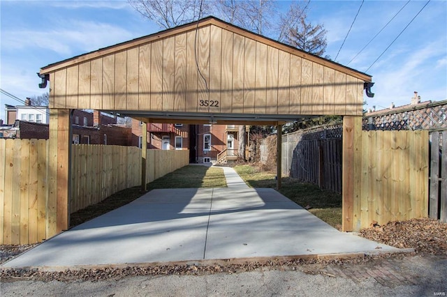 exterior space with a carport