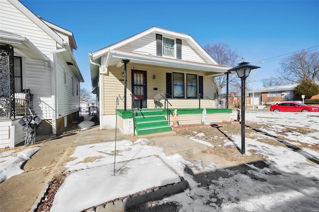 bungalow-style home featuring covered porch