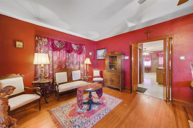 sitting room featuring hardwood / wood-style flooring