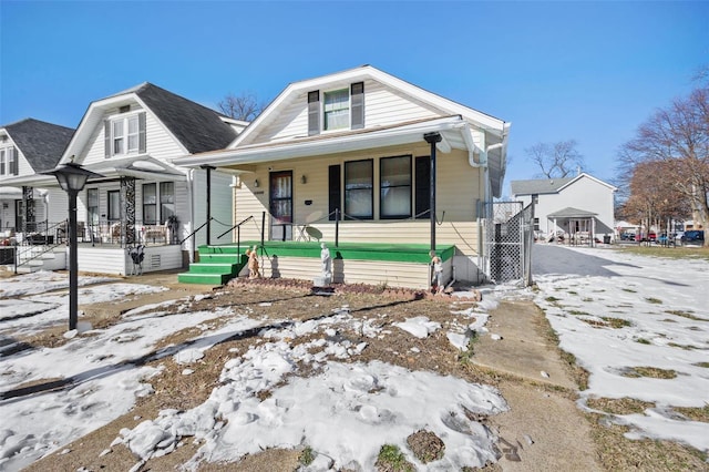 bungalow featuring covered porch