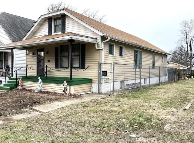 view of front of house featuring a front yard and a porch