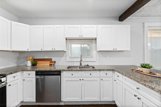 kitchen with sink, white cabinetry, beamed ceiling, and stainless steel appliances