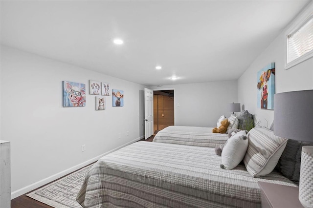 bedroom featuring hardwood / wood-style flooring