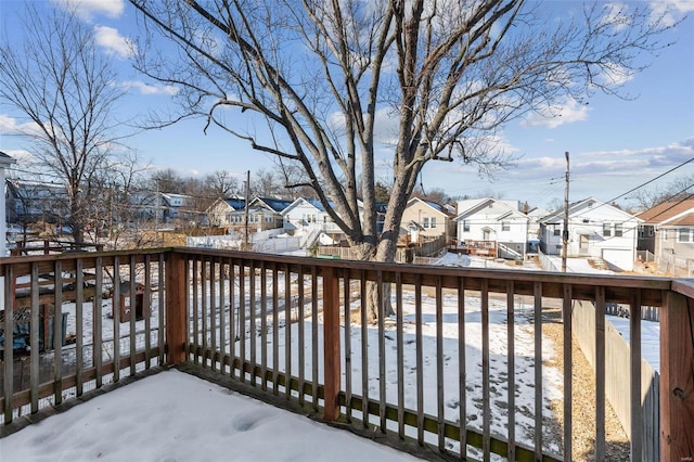 view of snow covered deck