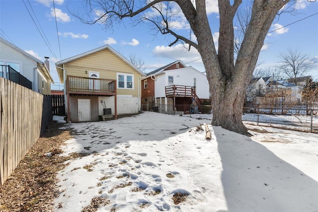 view of snow covered house