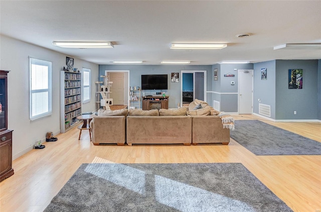 living room featuring light wood-type flooring