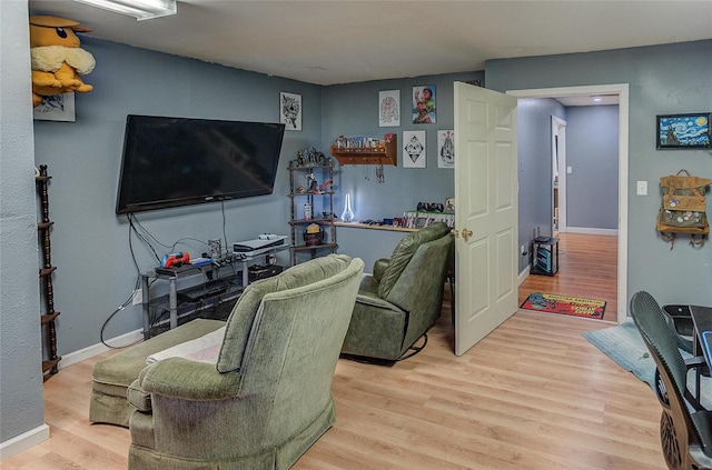 living room with light hardwood / wood-style flooring