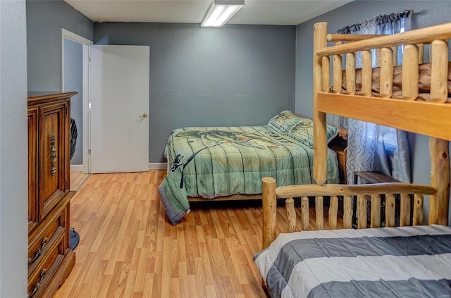 bedroom featuring light hardwood / wood-style flooring