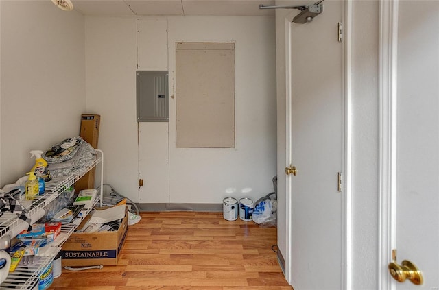 interior space featuring light wood-type flooring and electric panel