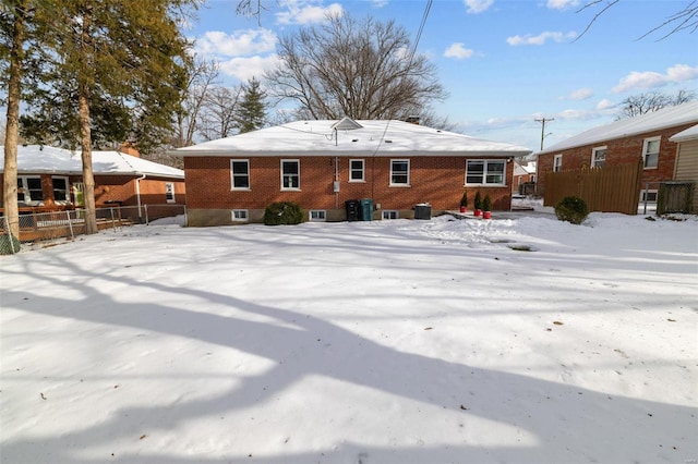 view of snow covered house