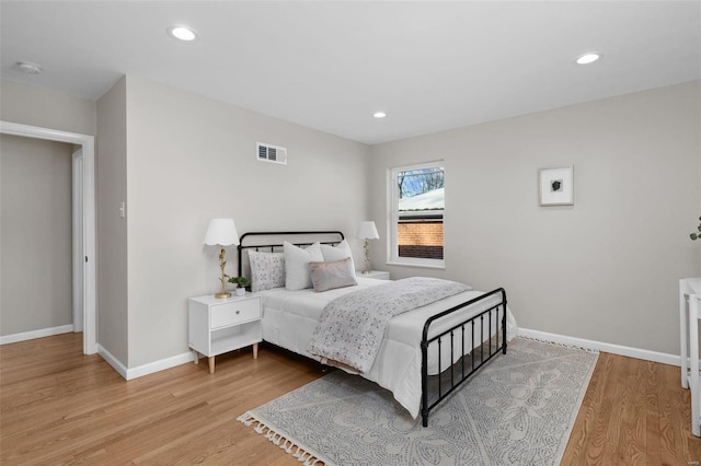 bedroom featuring light wood-type flooring