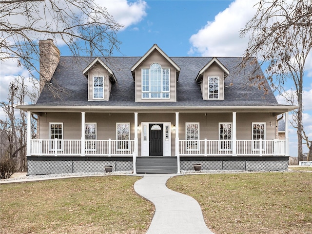 view of front of property featuring a porch and a front lawn