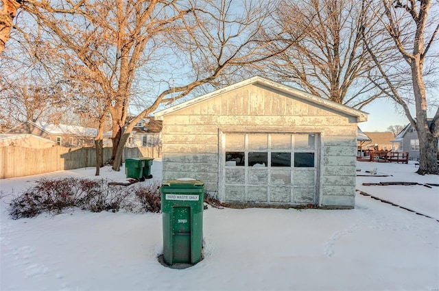 view of snow covered garage