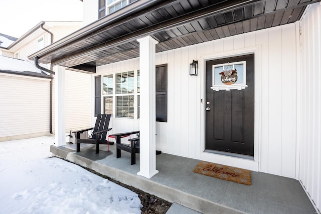 property entrance featuring covered porch