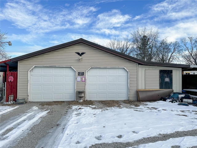 view of snow covered garage