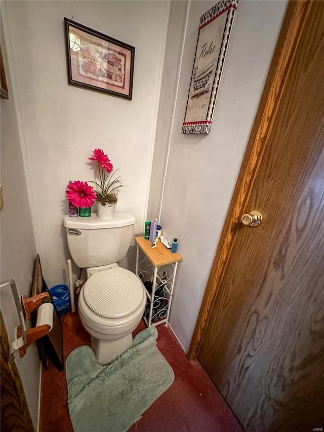 bathroom featuring toilet