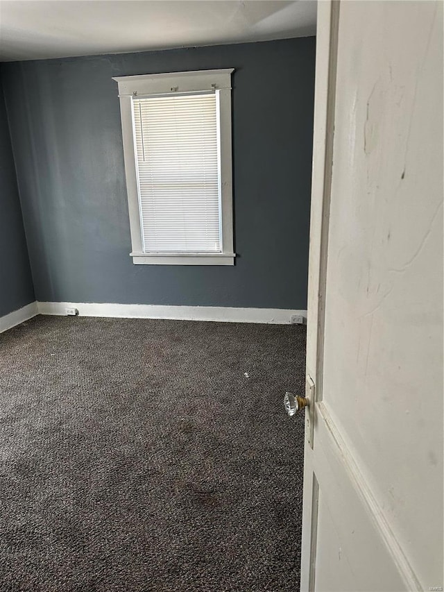 unfurnished room with carpet floors