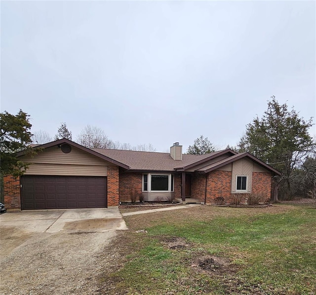 ranch-style home with a front yard and a garage