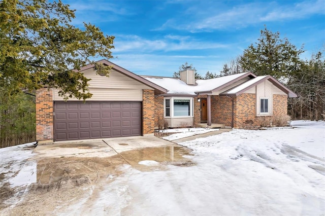 ranch-style home featuring a garage